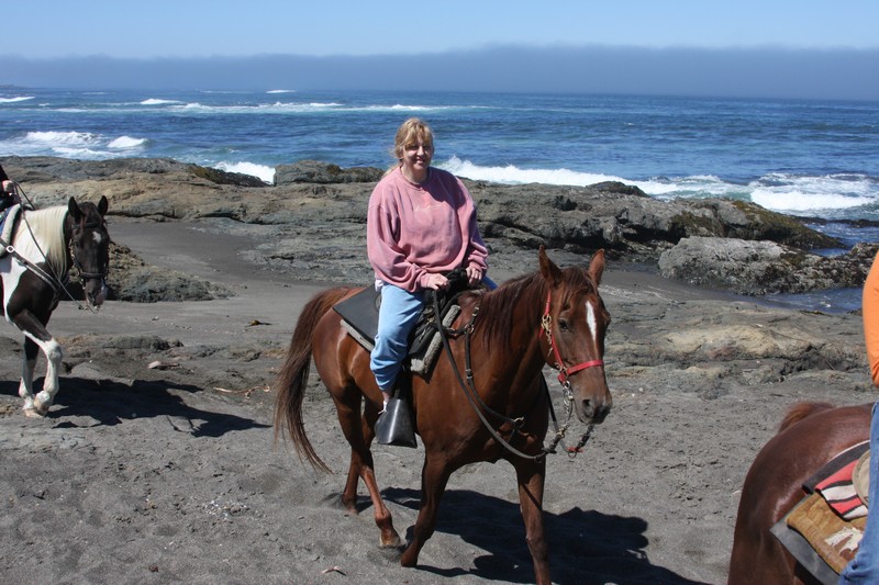Tessie riding horse.jpg